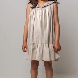 Adorable Beige Kids Dress with Floral Accents